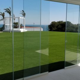 Instalación de corredera de cristal sin perfiles en Cantabria